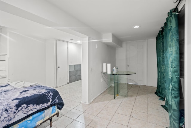 218 68th St, Guttenberg, NJ 07093 - bedroom with recessed lighting and light tile patterned floors