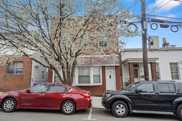 218 68th St, Guttenberg, NJ 07093 - townhome / multi-family property with brick siding