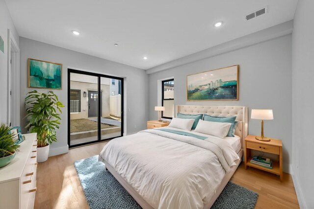 13 Manhattan Ave Unit 1, Jersey City, NJ 07307 - bedroom featuring light wood-style flooring, baseboards, access to outside, and recessed lighting