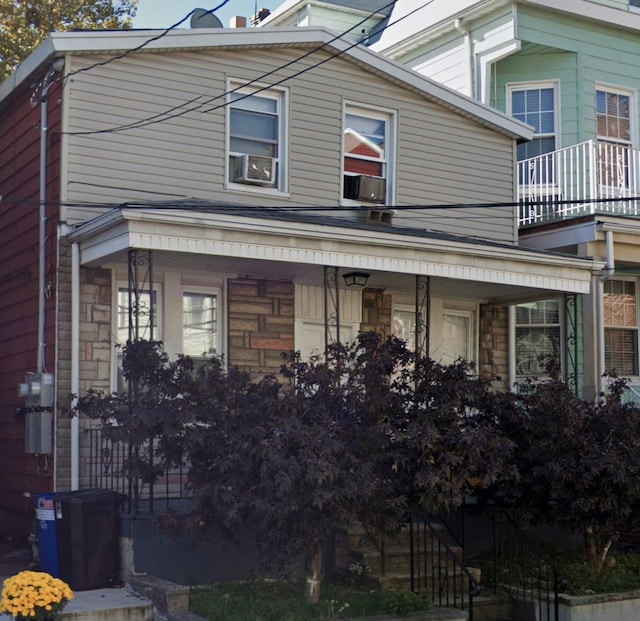 view of home's exterior with a porch