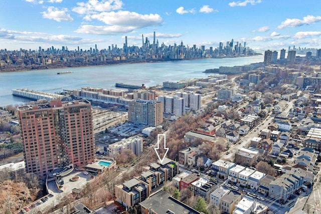 aerial view with a city view and a water view