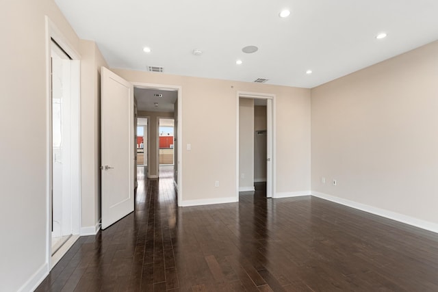 5 Washington Pl Unit 5-05, Cliffside Park, NJ 07010 - spare room featuring visible vents, dark wood-style flooring, and baseboards