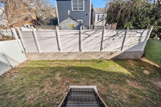 view of yard featuring a fenced backyard