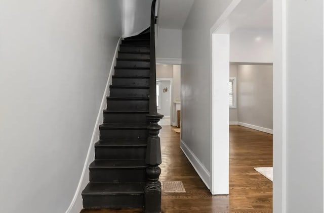 330 Forrest St, Jersey City, NJ 07304 - stairs featuring wood finished floors and baseboards