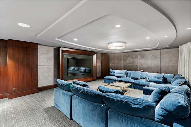 cinema featuring recessed lighting, a tray ceiling, and carpet floors