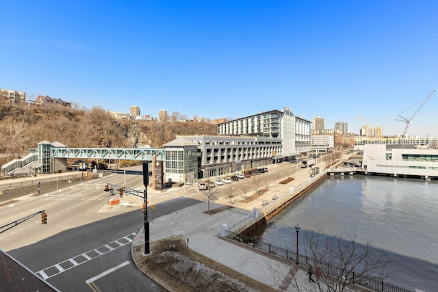 view of dock with a view of city