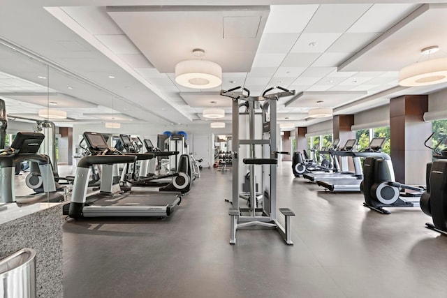 workout area with a drop ceiling