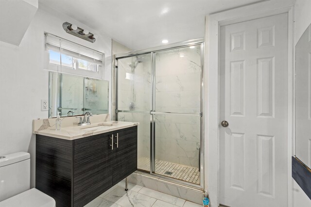 70 County Ave, Secaucus, NJ 07094 - bathroom featuring marble finish flooring, a shower stall, vanity, and toilet