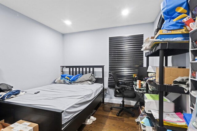 70 County Ave, Secaucus, NJ 07094 - bedroom featuring wood finished floors, recessed lighting, and an office area