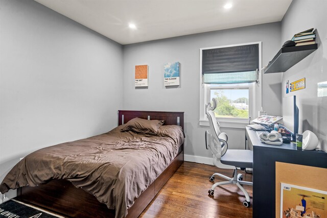 70 County Ave, Secaucus, NJ 07094 - bedroom featuring wood finished floors, recessed lighting, baseboards, and an office area