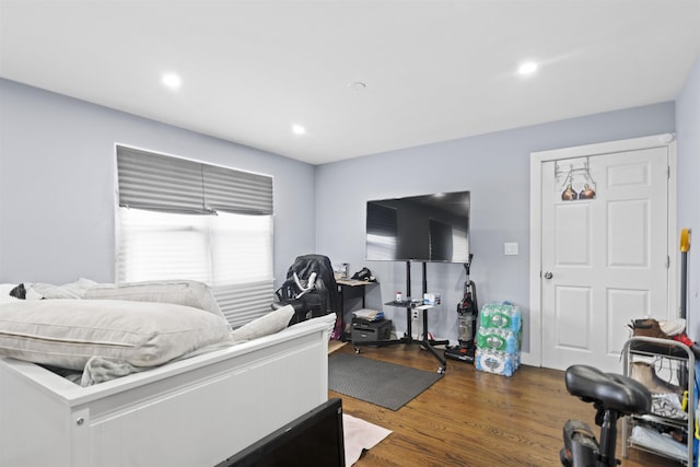 70 County Ave, Secaucus, NJ 07094 - bedroom with wood finished floors and recessed lighting