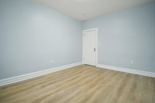 unfurnished room featuring light hardwood / wood-style flooring