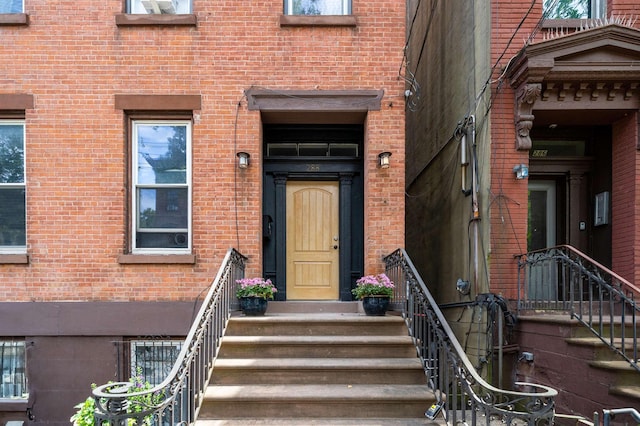 288 Barrow St Unit 2, Jersey City, NJ 07302 - doorway to property featuring brick siding