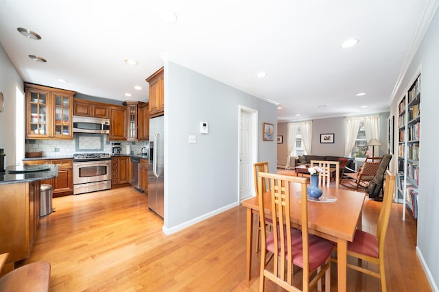 288 Barrow St Unit 2, Jersey City, NJ 07302 - dining room with crown molding, light wood-style floors, and recessed lighting