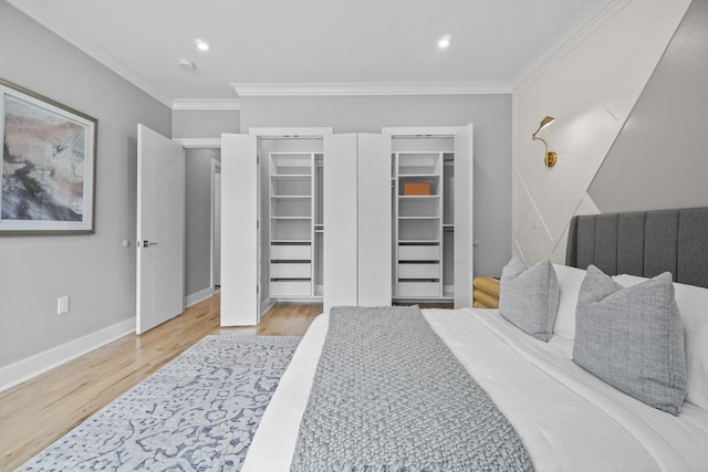 bedroom featuring baseboards, recessed lighting, wood finished floors, and crown molding