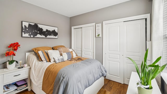4401 Park Ave Unit 2B, Union City, NJ 07087 - bedroom featuring two closets and dark wood-style floors
