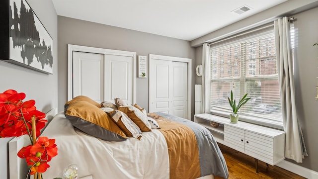 4401 Park Ave Unit 2B, Union City, NJ 07087 - bedroom with multiple closets and wood finished floors