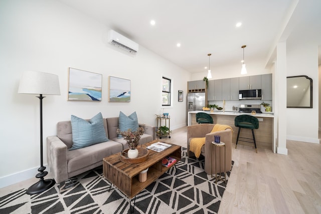 79 Vroom St Unit 1, Jersey City, NJ 07306 - living area with a wall mounted AC, light wood-type flooring, and recessed lighting
