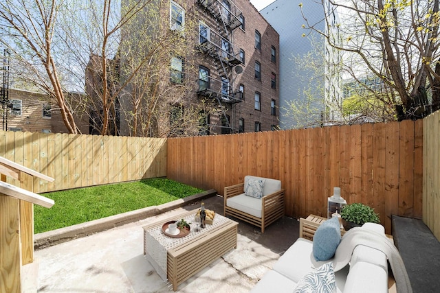 79 Vroom St Unit 1, Jersey City, NJ 07306 - fenced backyard with outdoor lounge area and a patio area