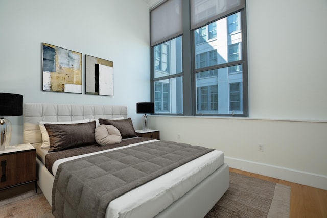 bedroom featuring hardwood / wood-style floors