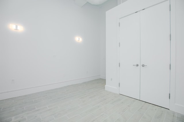 unfurnished bedroom with a closet