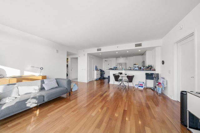 living room with light wood-type flooring