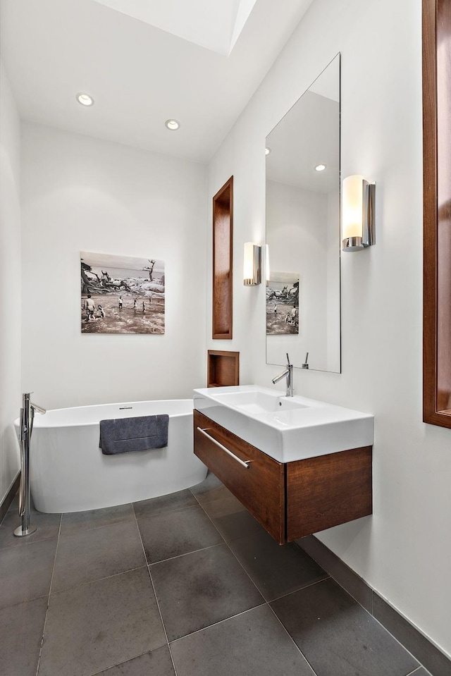 1110 Hudson St Unit 5B, Hoboken, NJ 07030 - bathroom featuring a soaking tub, recessed lighting, and vanity