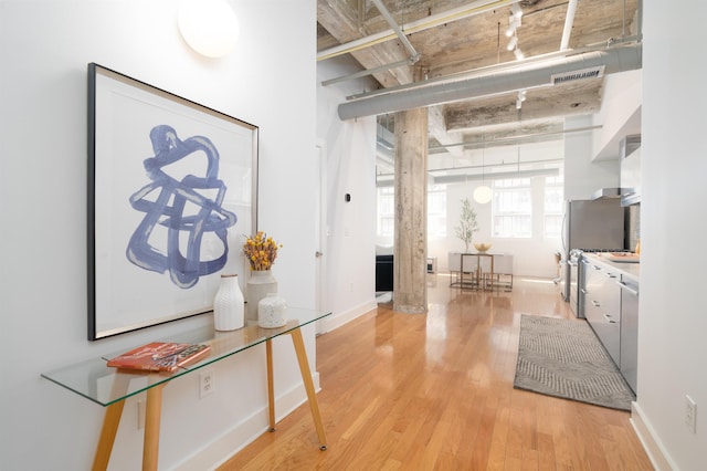 140 Bay St Unit 6G, Jersey City, NJ 07302 - foyer with track lighting and light wood finished floors