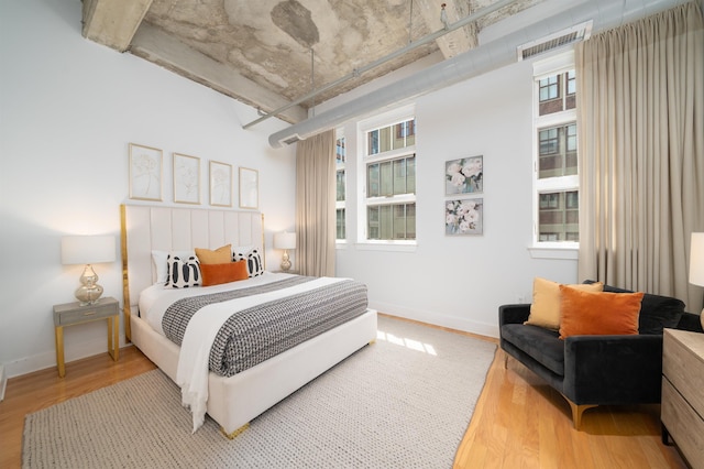 140 Bay St Unit 6G, Jersey City, NJ 07302 - bedroom featuring wood finished floors and baseboards