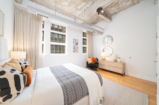 140 Bay St Unit 6G, Jersey City, NJ 07302 - bedroom with wood finished floors and baseboards