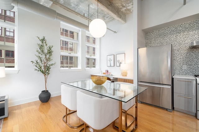 140 Bay St Unit 6G, Jersey City, NJ 07302 - dining area featuring light wood-style floors
