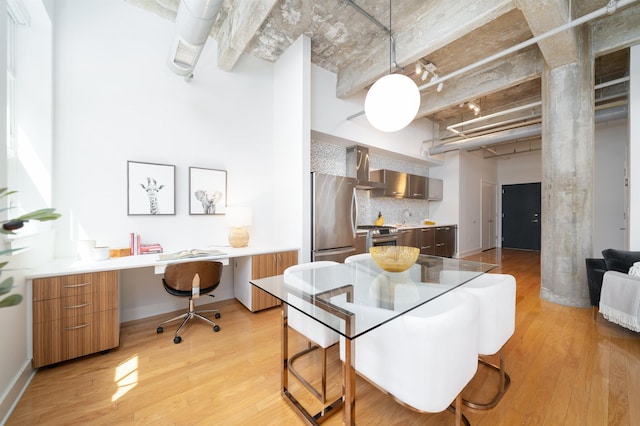 140 Bay St Unit 6G, Jersey City, NJ 07302 - dining area featuring light wood-type flooring and a desk