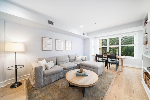833 Willow Ave Unit 2, Hoboken, NJ 07030 - living room with light wood-style flooring and recessed lighting