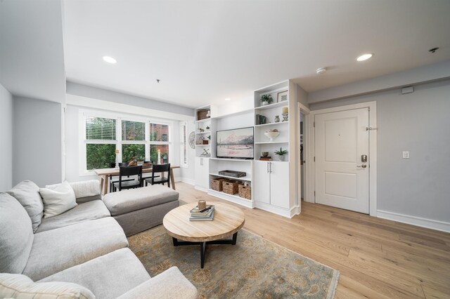 833 Willow Ave Unit 2, Hoboken, NJ 07030 - living room with light wood finished floors and recessed lighting