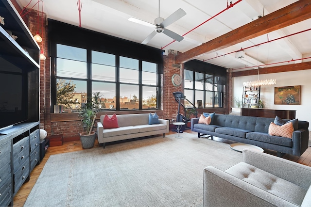 1620 Manhattan Ave Unit C3, Union City, NJ 07087 - living area featuring light wood-style floors, beam ceiling, ceiling fan, and brick wall