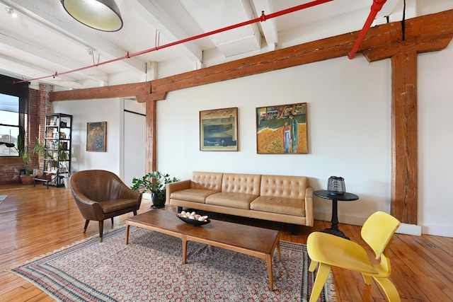 1620 Manhattan Ave Unit C3, Union City, NJ 07087 - living room featuring beam ceiling, wood-type flooring, and baseboards