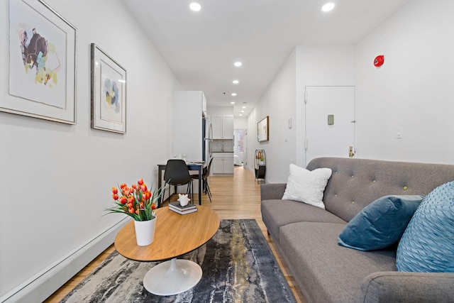 110 Washington St Unit 8, Hoboken, NJ 07030 - living area featuring light wood finished floors, recessed lighting, and baseboard heating