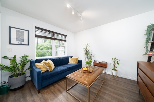 235 Sherman Ave, Jersey City, NJ 07307 - living room featuring dark wood finished floors, track lighting, and baseboards