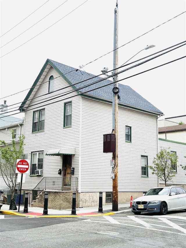 149 37th St, Union City, NJ 07087 - view of front of house with roof with shingles