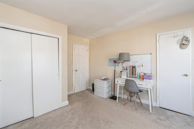 home office with carpet and baseboards