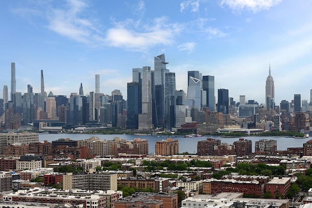 property's view of city with a water view