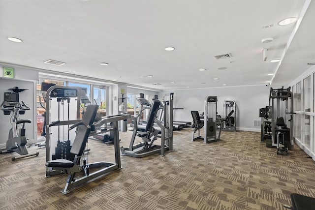 exercise room featuring visible vents, recessed lighting, carpet flooring, and baseboards