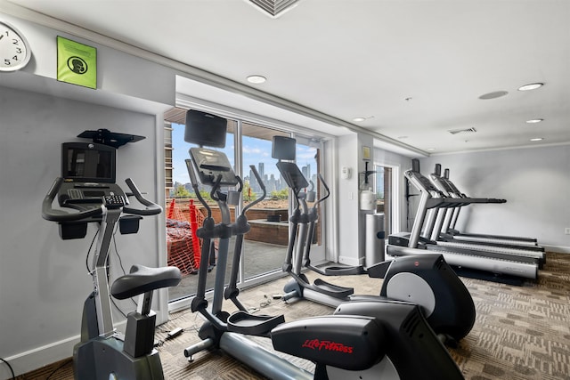 gym with baseboards, recessed lighting, and visible vents