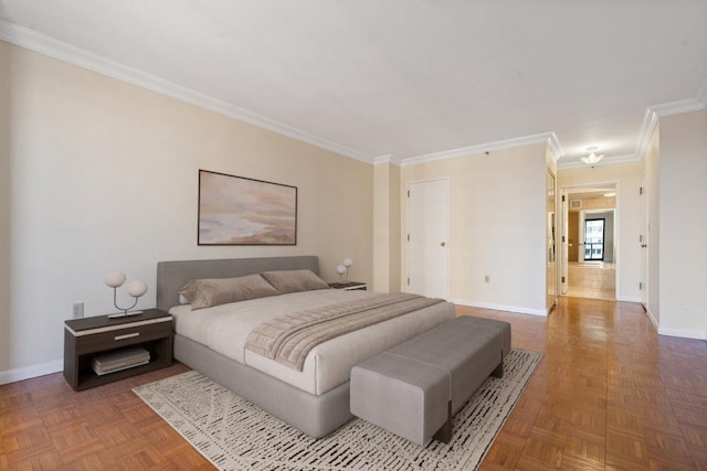 bedroom with baseboards and ornamental molding