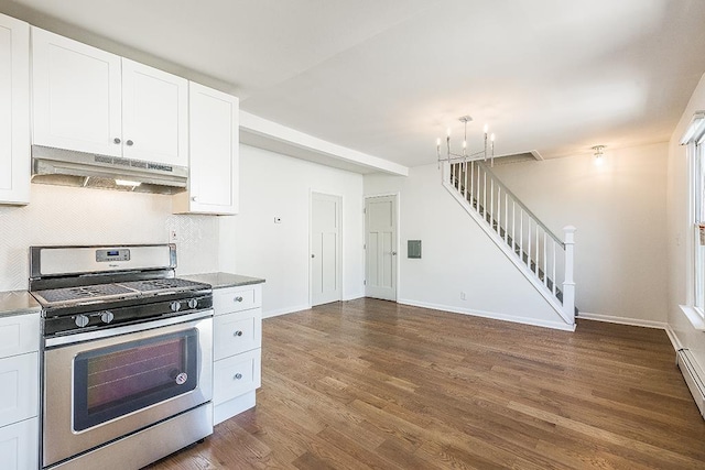 kitchen with a baseboard radiator, dark hardwood / wood-style flooring, a chandelier, white cabinets, and stainless steel range with gas stovetop