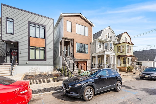 view of front of house with a residential view