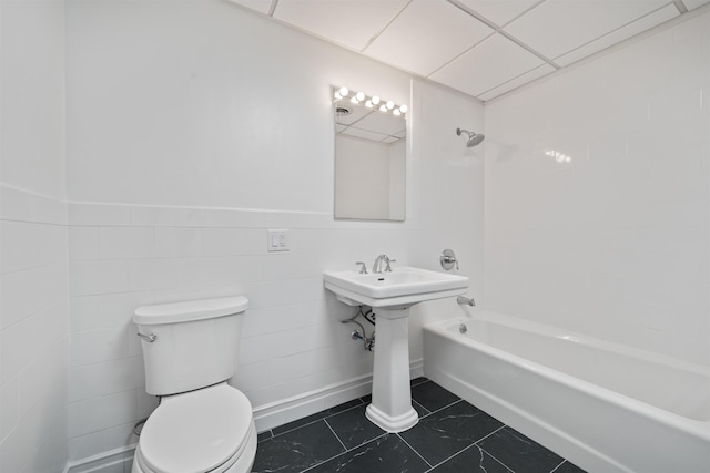 300 Communipaw Ave Unit 11, Jersey City, NJ 07304 - bathroom featuring toilet, bathtub / shower combination, tile patterned floors, and a sink