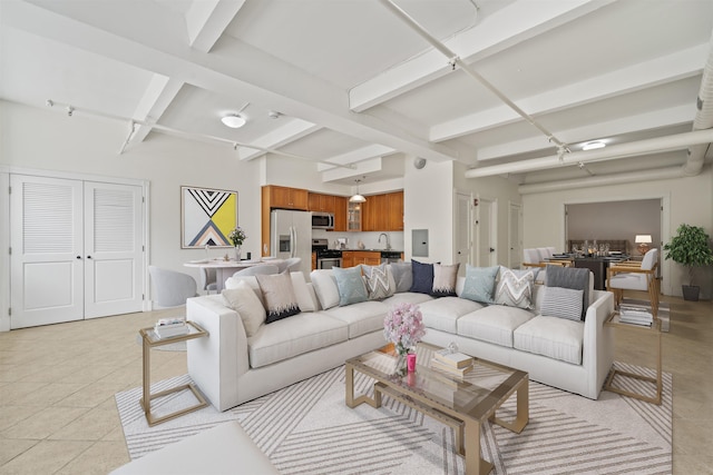 300 Communipaw Ave Unit 11, Jersey City, NJ 07304 - living area with beam ceiling, light tile patterned floors, and coffered ceiling