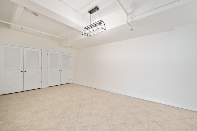 300 Communipaw Ave Unit 11, Jersey City, NJ 07304 - garage with baseboards