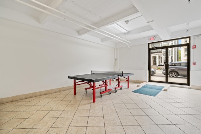 300 Communipaw Ave Unit 11, Jersey City, NJ 07304 - recreation room featuring coffered ceiling, beamed ceiling, light tile patterned floors, and baseboards